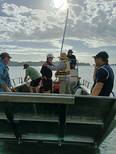 2024 Mahurangi Regatta marquee crew departing Ōpahi aboard the J Barry Ferguson. Credit: Sarah Ransom