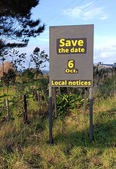Mahurangi West local notices signboard displaying 6 November save-the-date